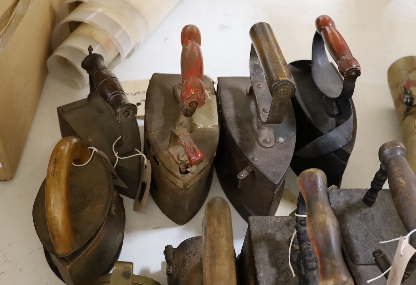 Nine various slug irons, tallest 22cm